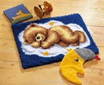 Tapis point noué Nounours dans les nuages