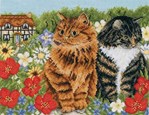 Deux chats dans les fleurs