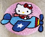 Tapis point noué hello kitty est pilote