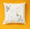 Coussin les oiseaux au ruban couleur